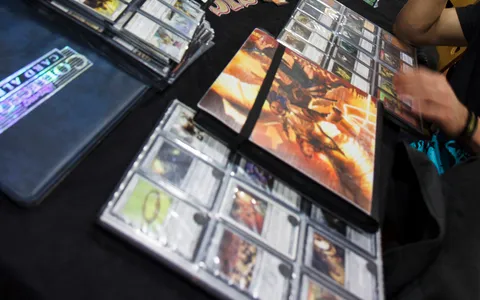 Binders of Magic: The Gathering cards laid out for trading